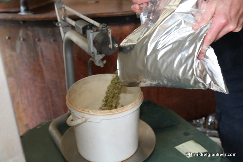 Photo of hop pellets being weighed Brasserie Dupont