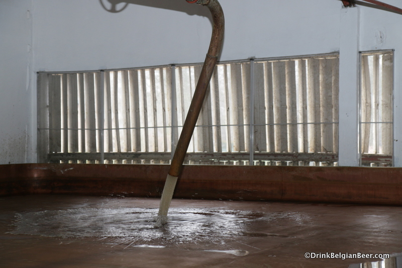 Hot wort being pumped into the coolship at Timmermans. 
