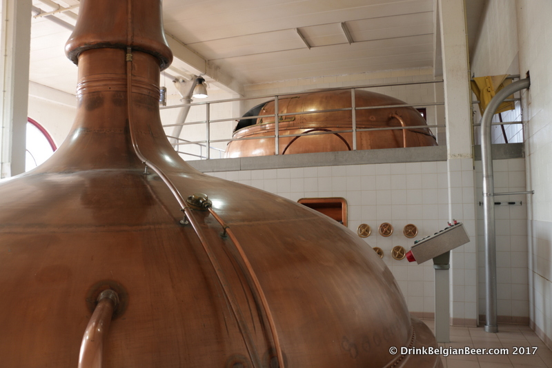 A boiling kettle at Lindemans, lower foreground, and mash tun, upper background. 