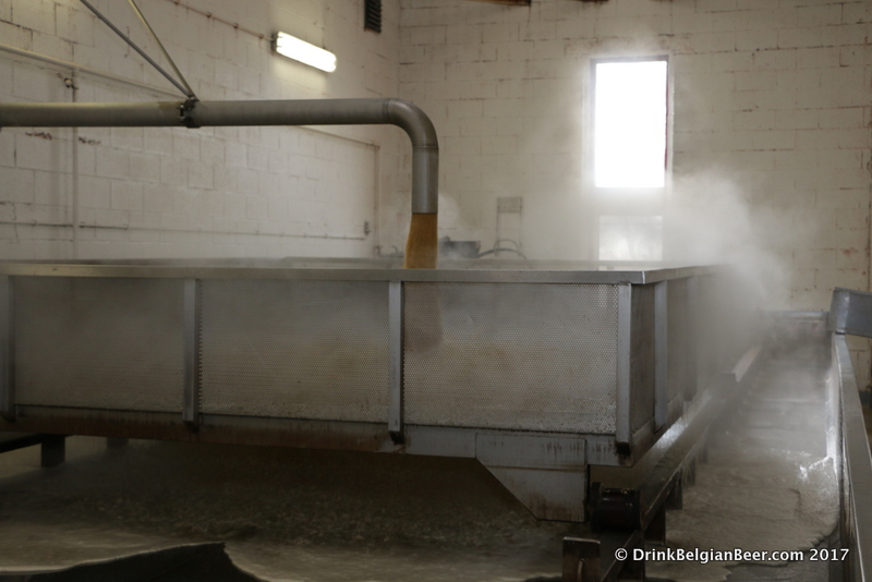 Another photo of wort being pumped into the larger coolship at Lindemans. 