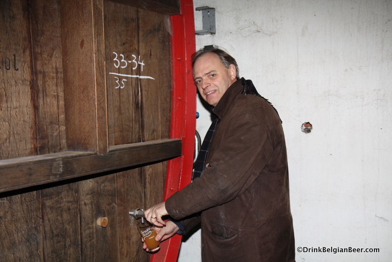 Frank Boon pulling a sample of lambic right from a foeder. 