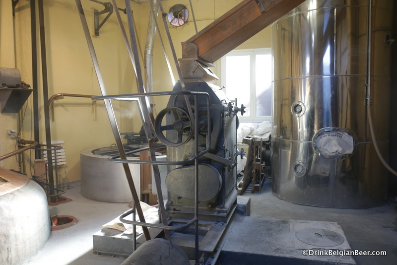 The grain mill with the two copper boiling kettles to the left. 