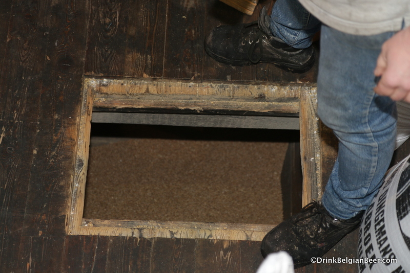 Close up of the trapdoor hole in the floor of Cantillon's attic (top  floor of the brewery.)
