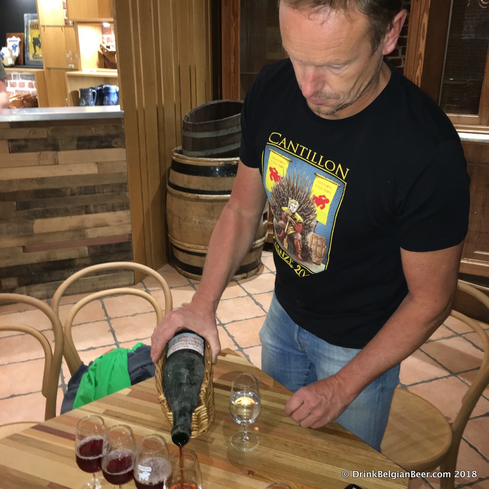 Jean Van Roy pouring Pure Kriek Cantillon 1996 in the new, upstairs tasting room inside the brewery. 