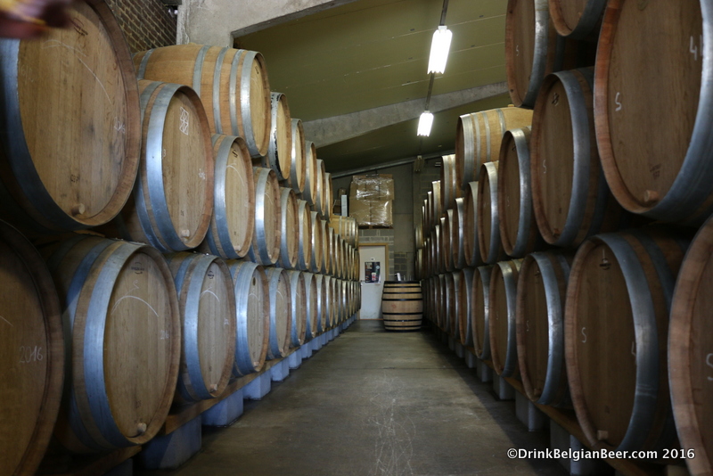 Rows of 400-liter barrels at Gueuzerie Tilquin. 