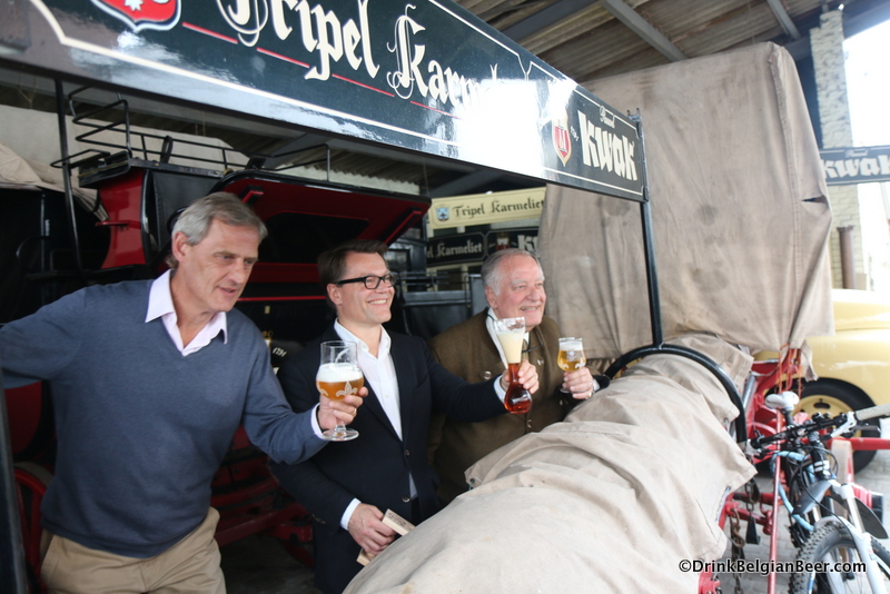 Antoine Bosteels (center) and Ivo Bosteels (right) giving a toast.