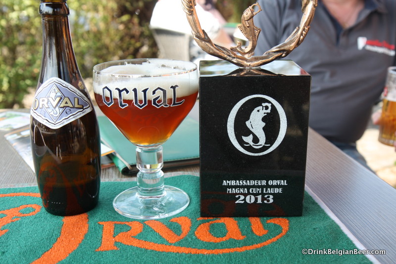 The 2013 Magna Cum Laude Orval Ambassador trophy. With an Orval.
