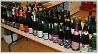 Bottles of Oude Geuze, Oude Kriek, and more at a previous event.