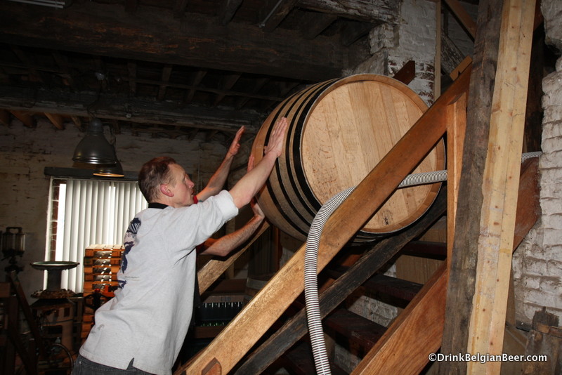 Jean Van Roy, Brasserie Cantillon, moving a barrel from one floor to another. 