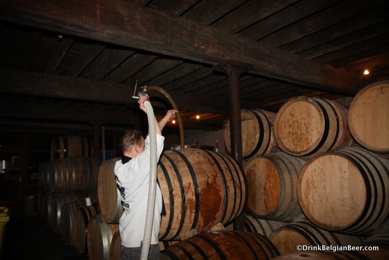 Filling a barrels with Iris, a special lambic brew. 