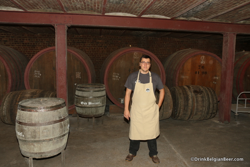 Oud Beersel blender/owner Gert Christiaens in a room with foeders and some smaller barrels. 