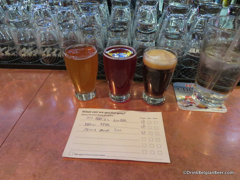 A sampler of three brews, including an Oud Beersel Lambic and Struise Smonk 2011.