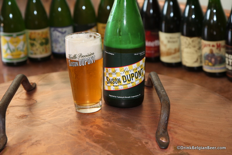 Saison Dupont, the world's benchmark saison beer, shown on top of the copper  boiling kettle at Brasserie Dupont. 