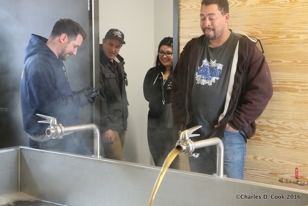 A happy moment at The Veil Brewing Company. After months of hard work, brewing has begun. 