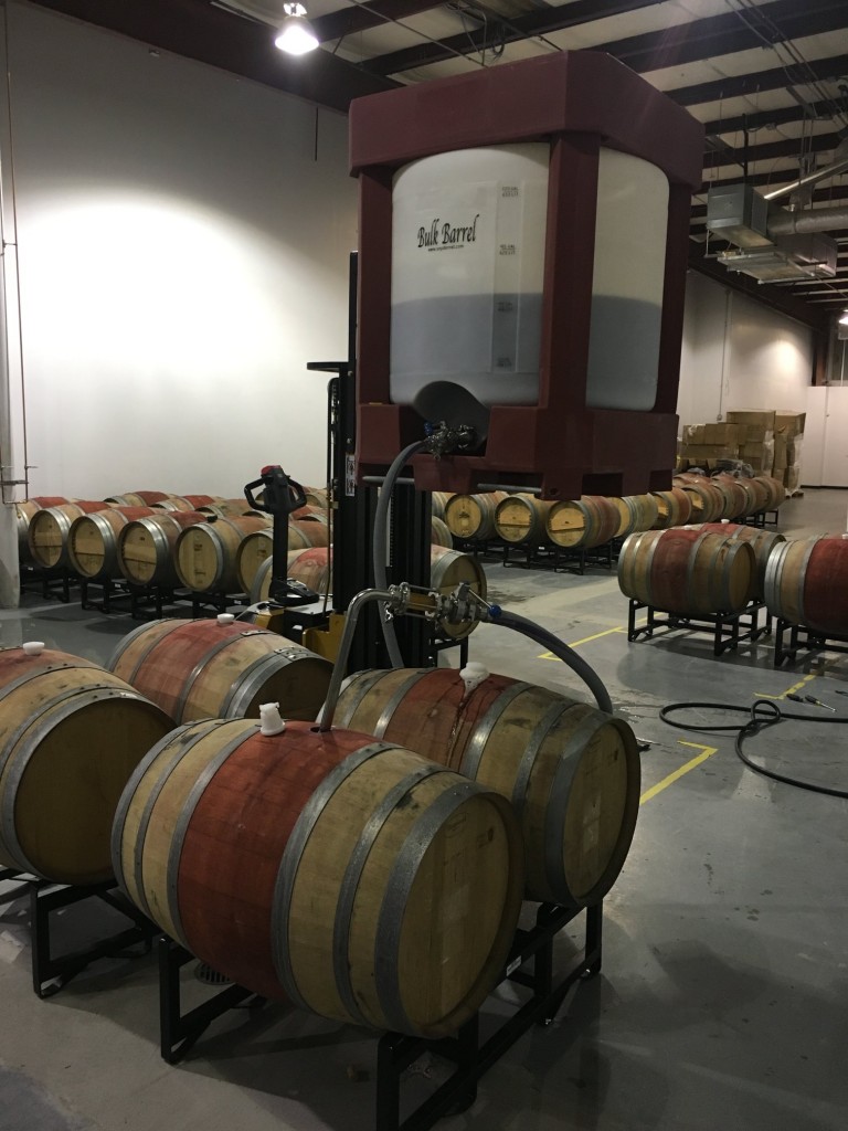 Barrels being filled at The Veil's maturation facility. Photo courtesy Matt Tarpey.