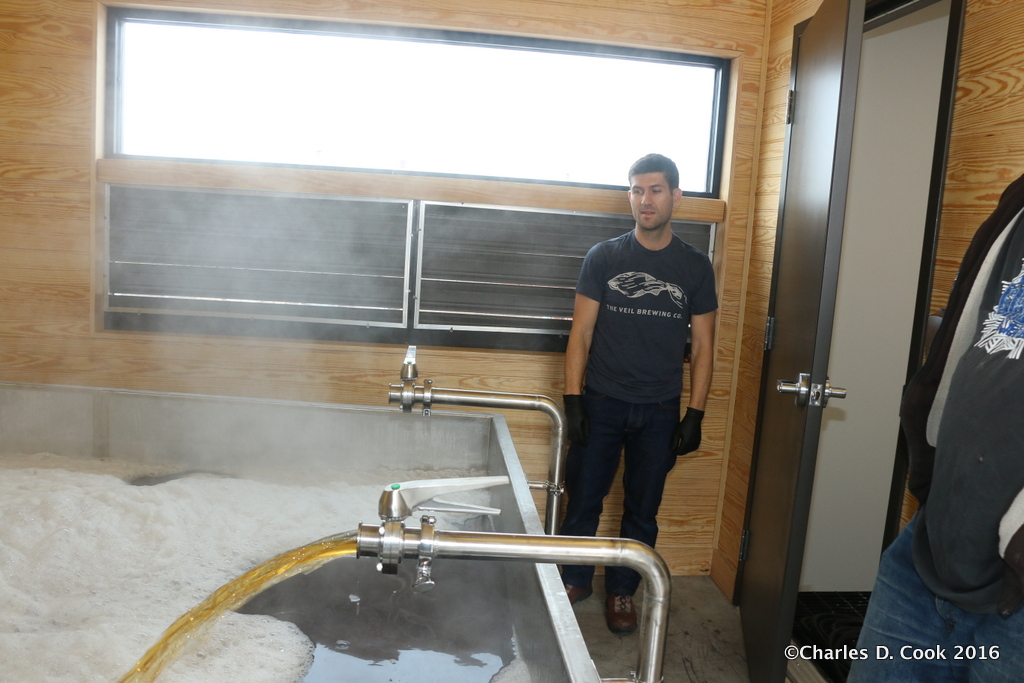 The coolship fills with wort at The Veil Brewing Company. 