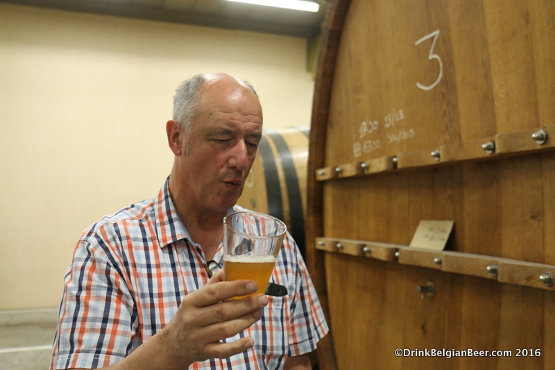 Armand sampling a six month old lambic, pulled directly from a foeder. 