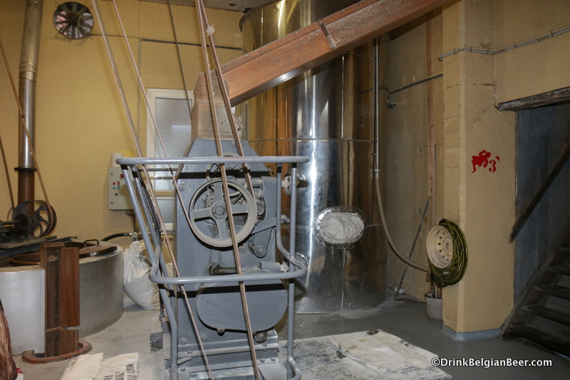 The grain mill/crusher at Brasserie Cantillon, which is on the 2nd floor of the brewery and in the same room with the copper boiling kettles. 