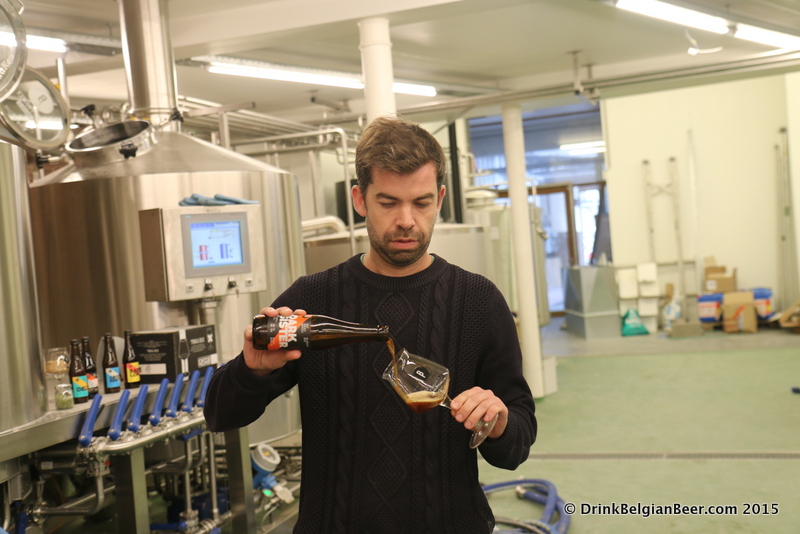 Sébastien Morvan pouring a Dark Sister inside the brewery, which is just beyond the taproom. 