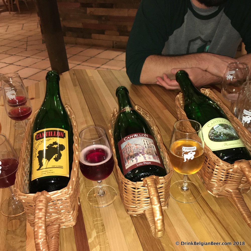 A 2015 Cantillon Lou Pepe Kriek (glass on left) along with a Carignan (left) and Mamouche (right.)