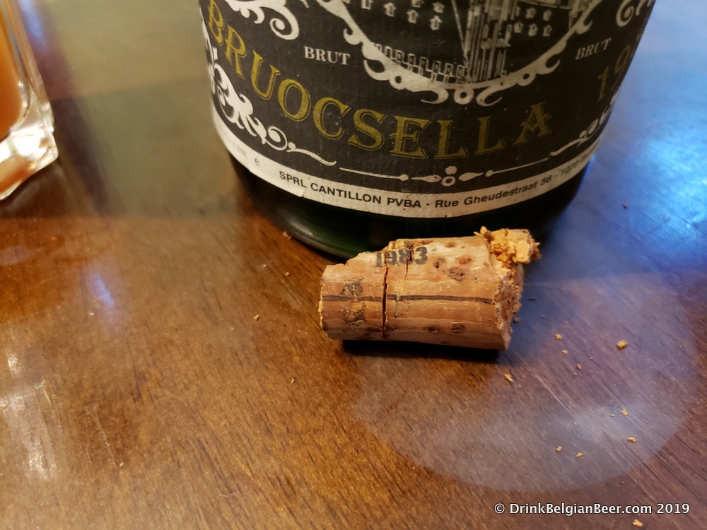 A shot of the 1983 Cantillon Grand Cru Bruocsella cork and lower part of the bottle label. 