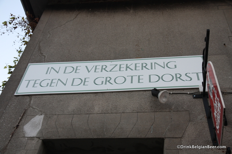 The sign above the front door lets you know that you are at In de Verzekering tegen de Grote Dorst. 