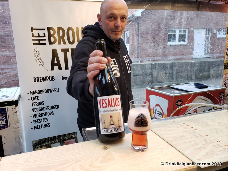 Steven Bollion of Malterfakker and Het Brouwateljee in Lubeek, a cafe where you can drink and eat, with a brewery. He holds Vesalius, a delicious fruit beer made with Schaarbeekse Krieken. 