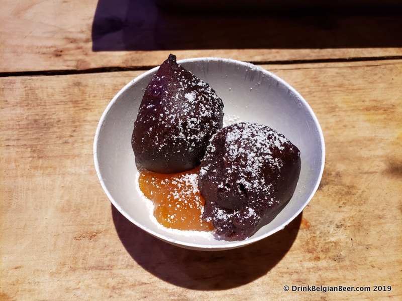 This is "Chocolade Beignet" with Abrikoos, meaning deep friend chocolate with pureed apricots. A great dessert dish!
