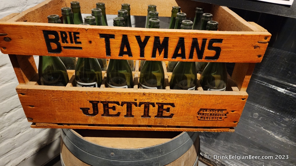 An old wooden crate full of vintage bottles of Taymans Gueuze, at the entrance to the modern brewery. Sadly, the bottles are all empty!