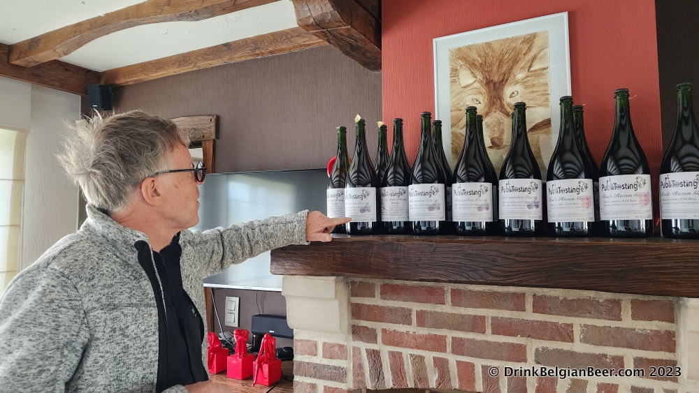 Geert Demuynck pointing at a special magnum sized bottle of lambic made for Italian beer tour guide Dino Sovilla. Dino is a well known figure in the Belgian beer world. 